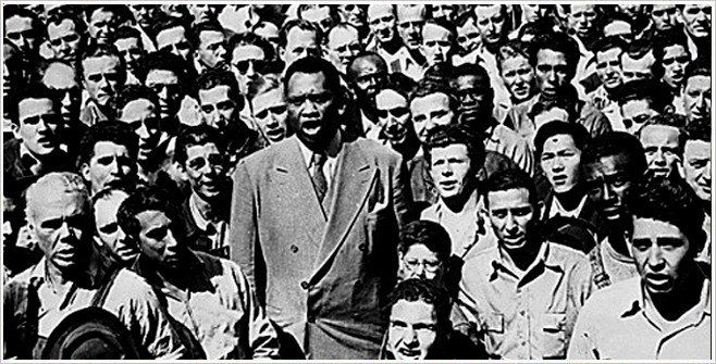 Paul Robeson leads Oakland shipyard workers in the singing of the National Anthem